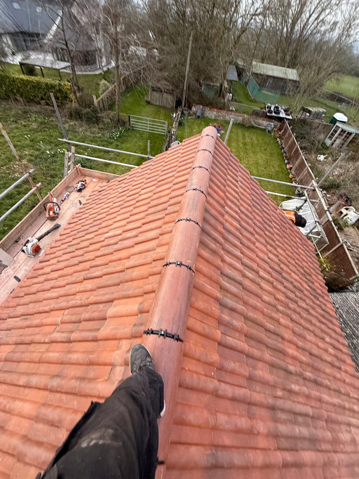 Roof Cleaning — Moss, algae and debris removal that restores appearance and protects your roof.