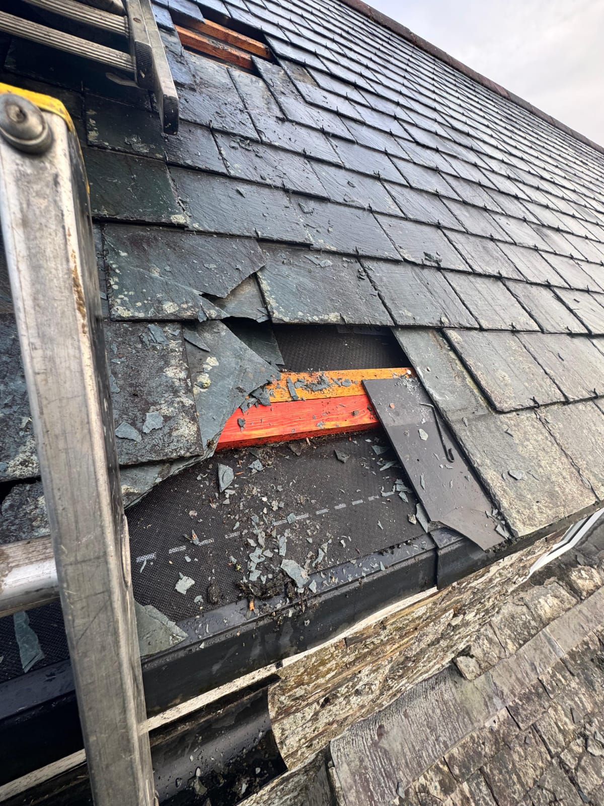 Storm-Damaged Slate Repair — roofing work in the South
