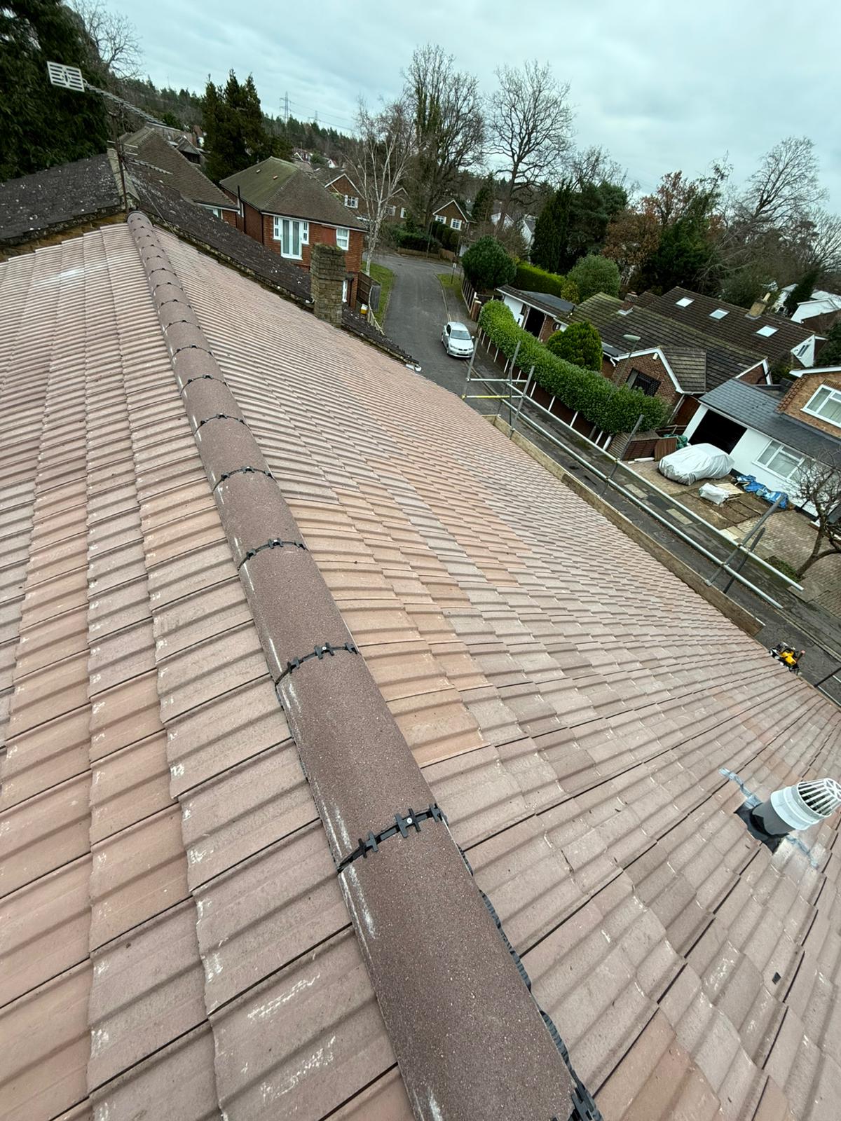 New Roofs — Full re-roofs in tile and slate, built to last and fully guaranteed.