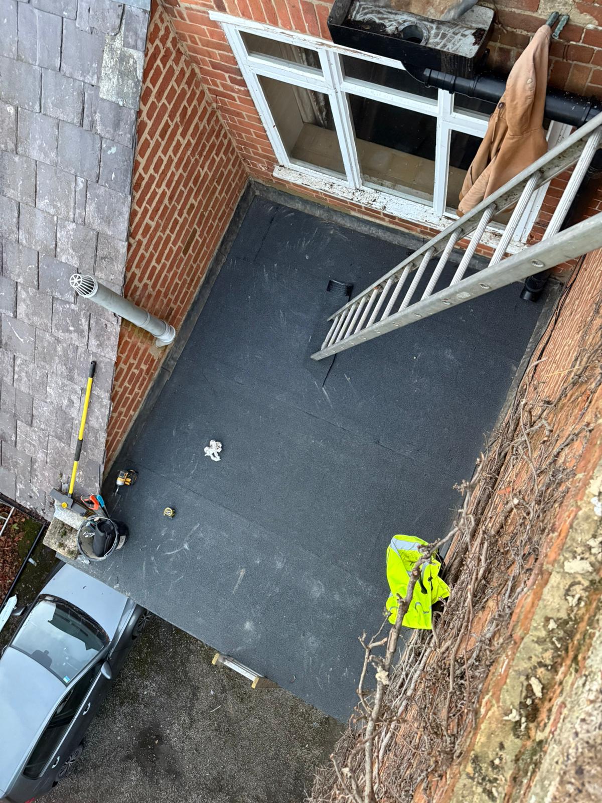 Torch-On Flat Roof Renewal — roofing work in the South
