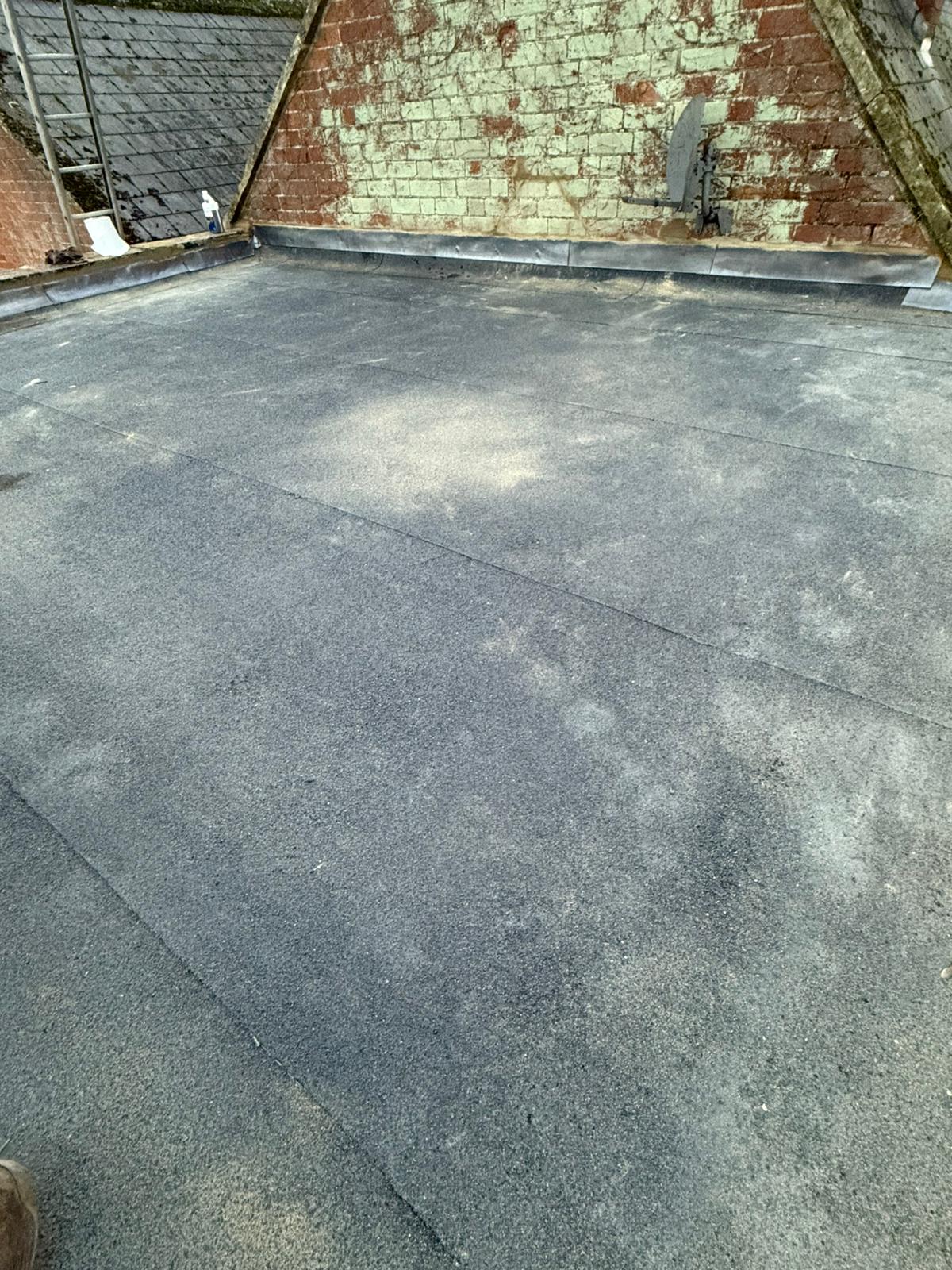 Torch-On Flat Roof Finish — roofing work in the South